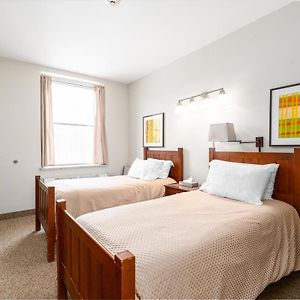 2 Single Beds Full Bathroom